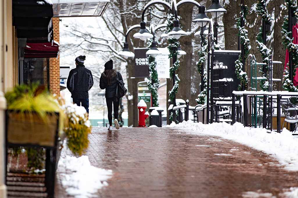snowy day at retail shopping center - commercial snow removal